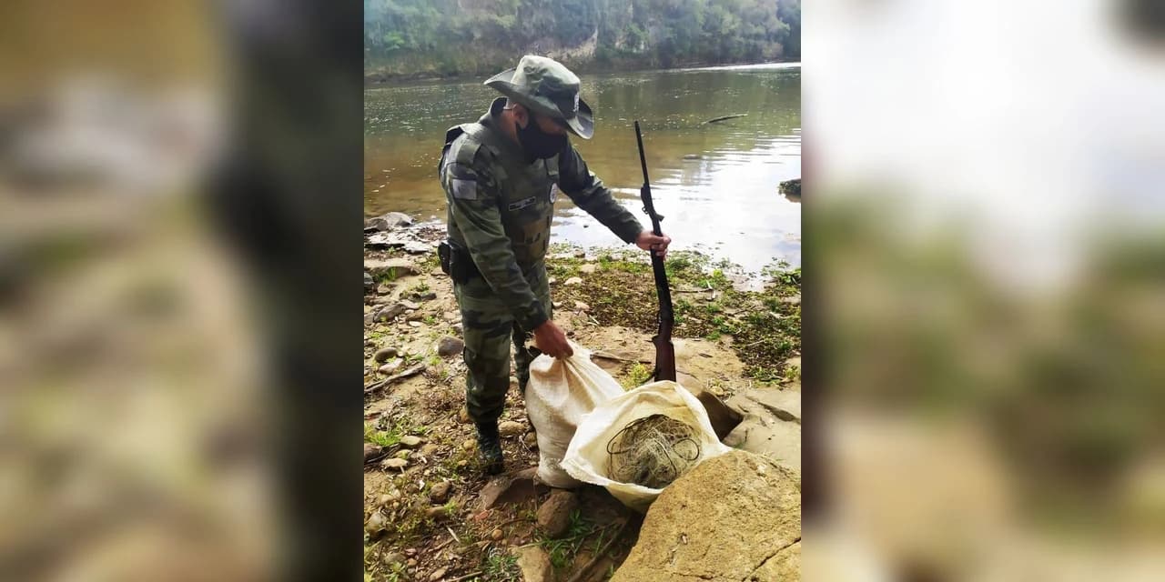 Policiais ambientais encontram redes e espingarda calibre 36 as margens do rio Tibagi